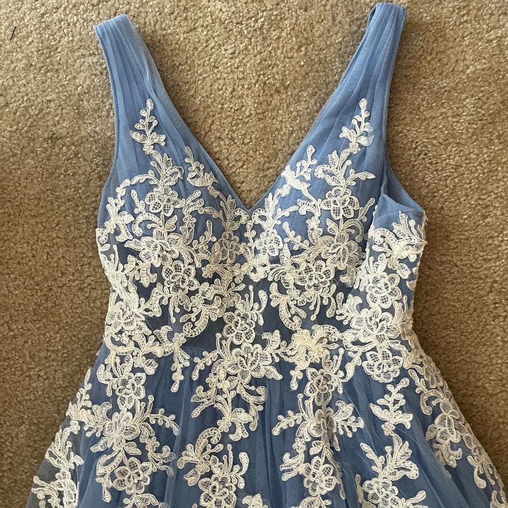 Blue ball gown with train